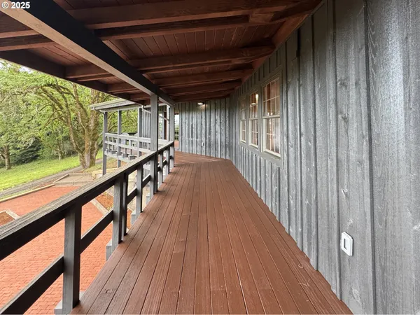 a view of a house with wooden floor and a window