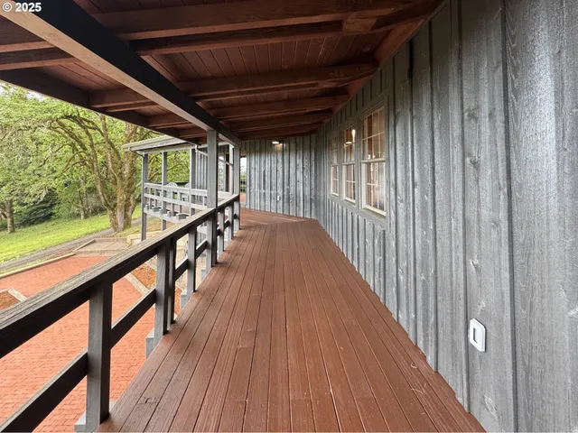 a view of a house with wooden floor and a window