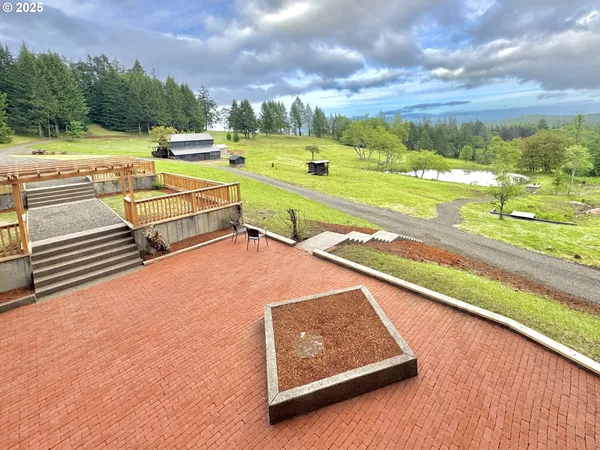 a view of a swimming pool with a patio