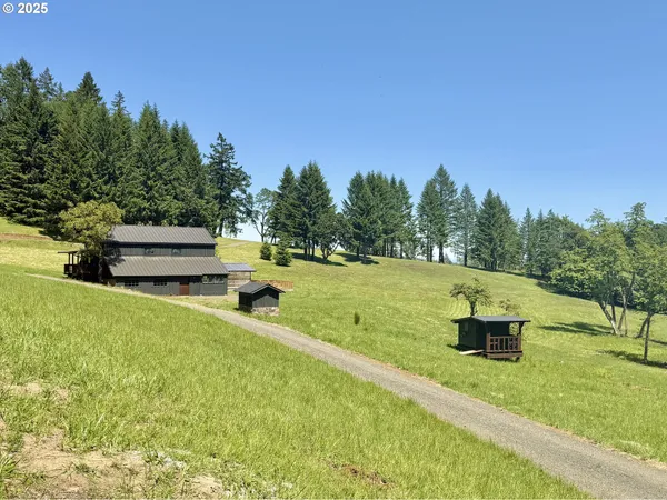 a front view of house with garden