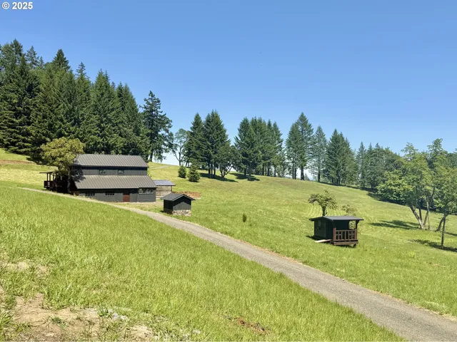 a front view of house with garden