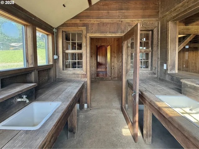 a bathroom with a bathtub and shower