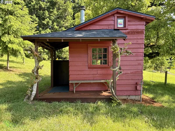 a view of a town with mountains in the background
