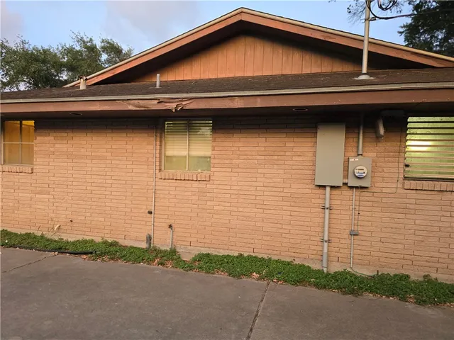 a front view of a house with garage