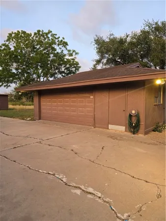 a front view of a house with a garage