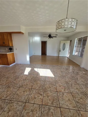 a view of a livingroom with a furniture