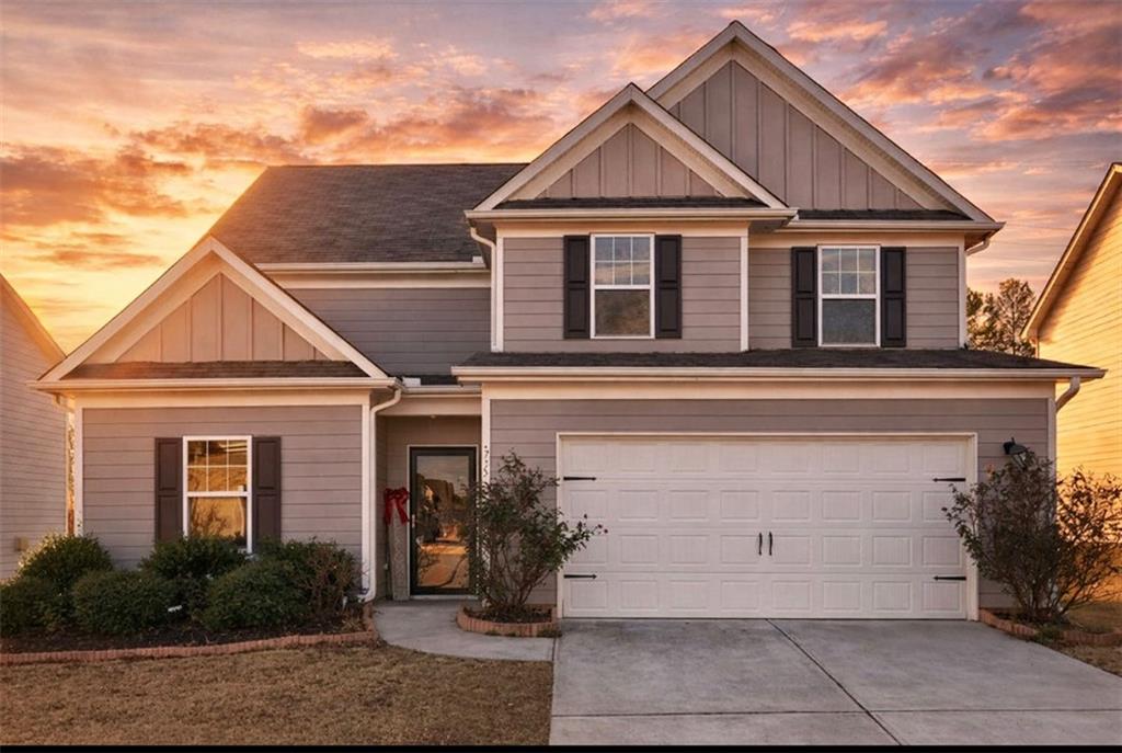 front view of a house with a yard