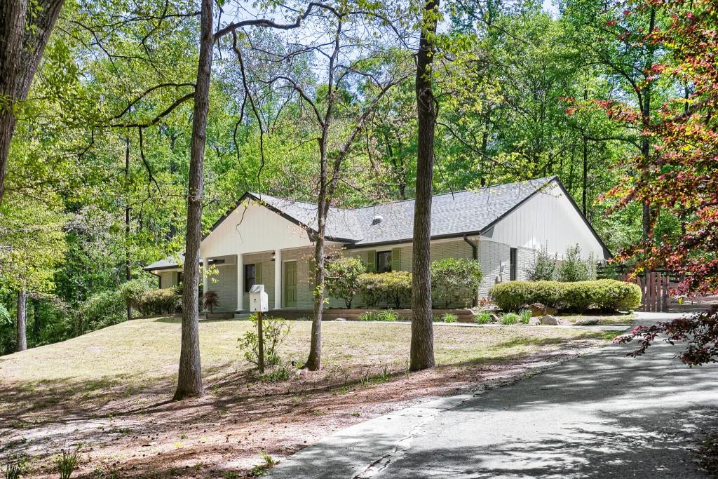 2021 Irwin Bridge Road Northwest Conyers, GA 30012 - Photo 2 of 43 a house view with a outdoor space
