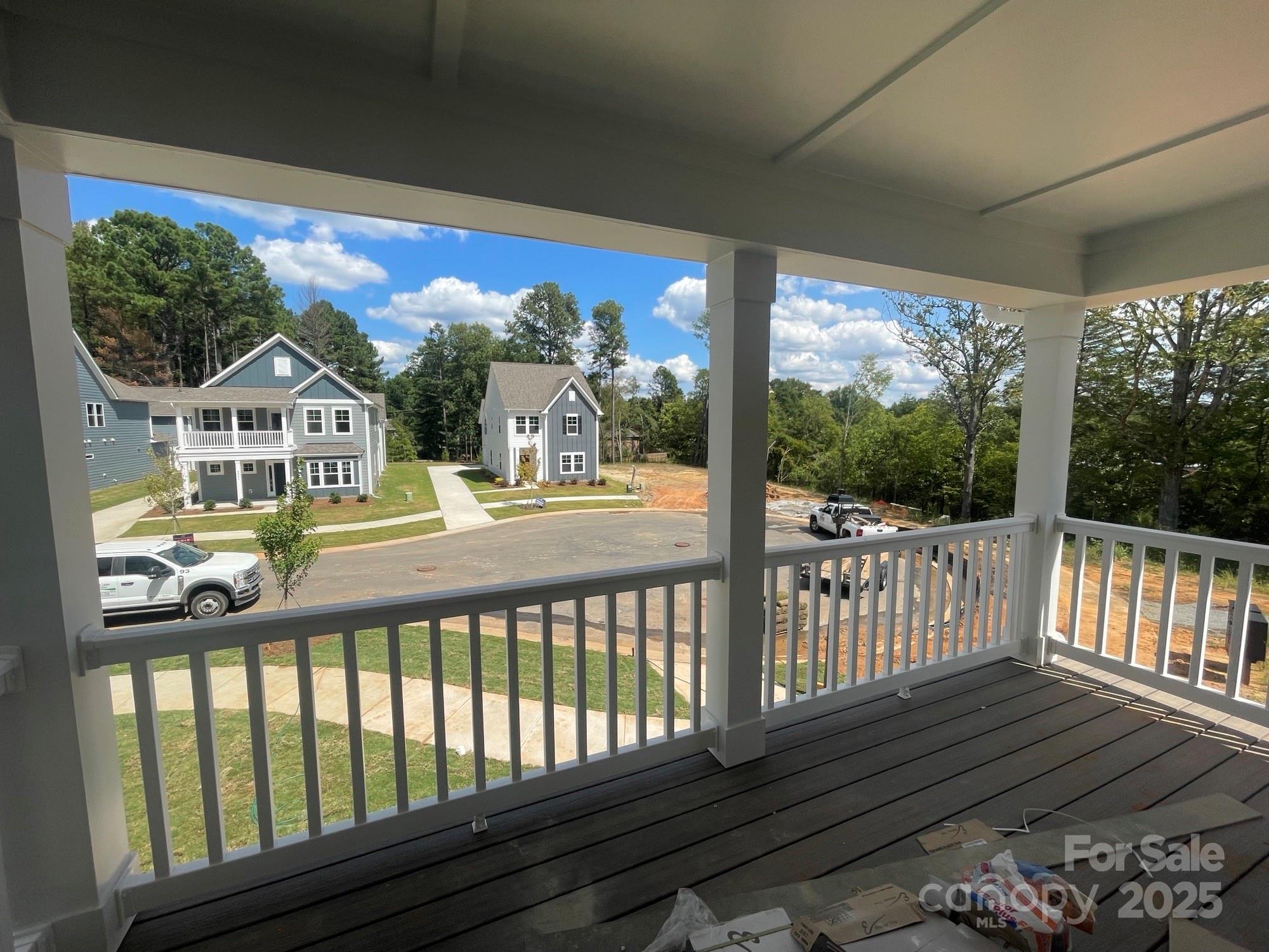 4044 Grommet Court Matthews, NC 28105 - Photo 13 of 27 a view of a street from a balcony
