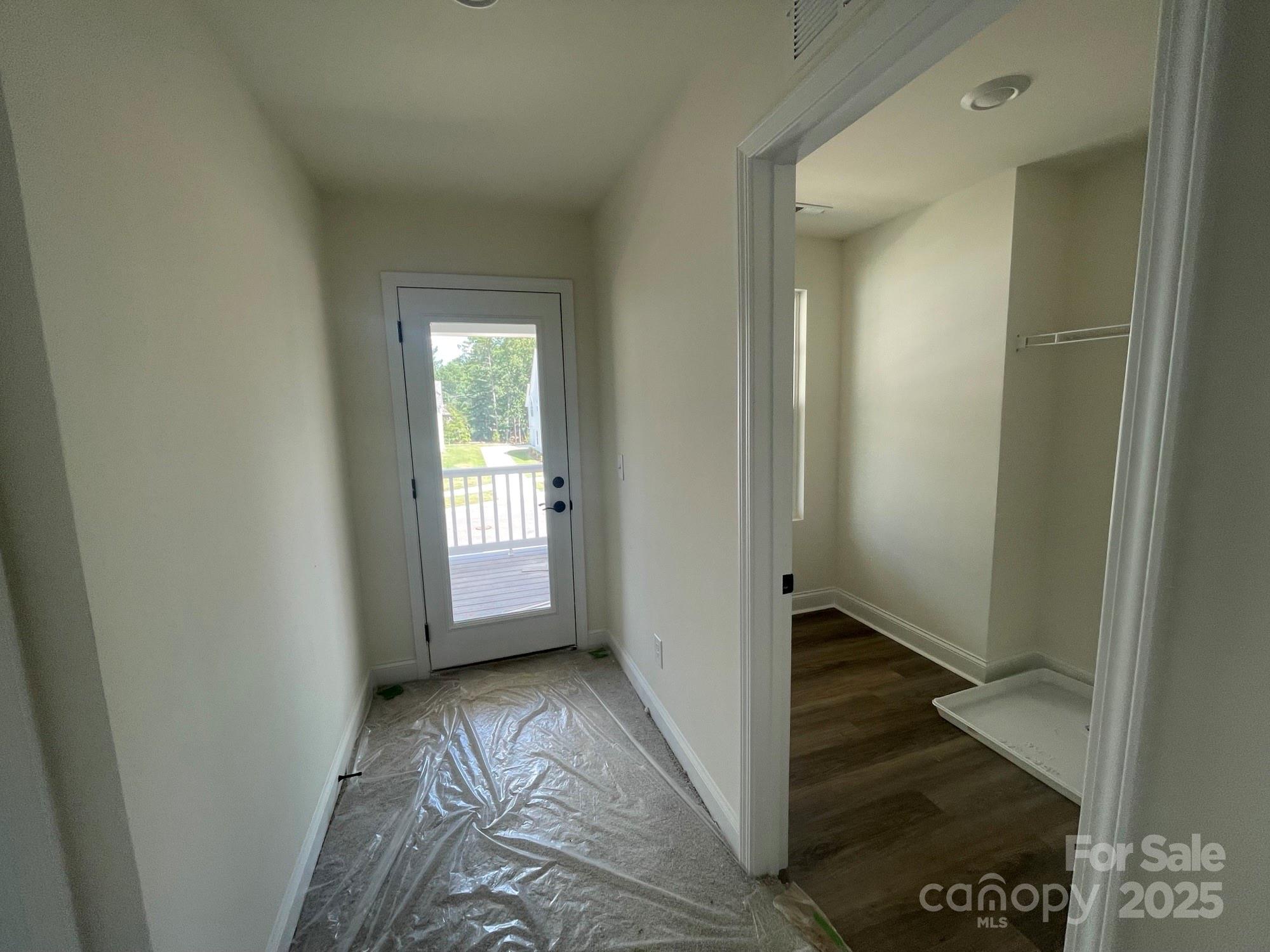 4044 Grommet Court Matthews, NC 28105 - Photo 20 of 27 a view of a room with wooden floor and a bathroom