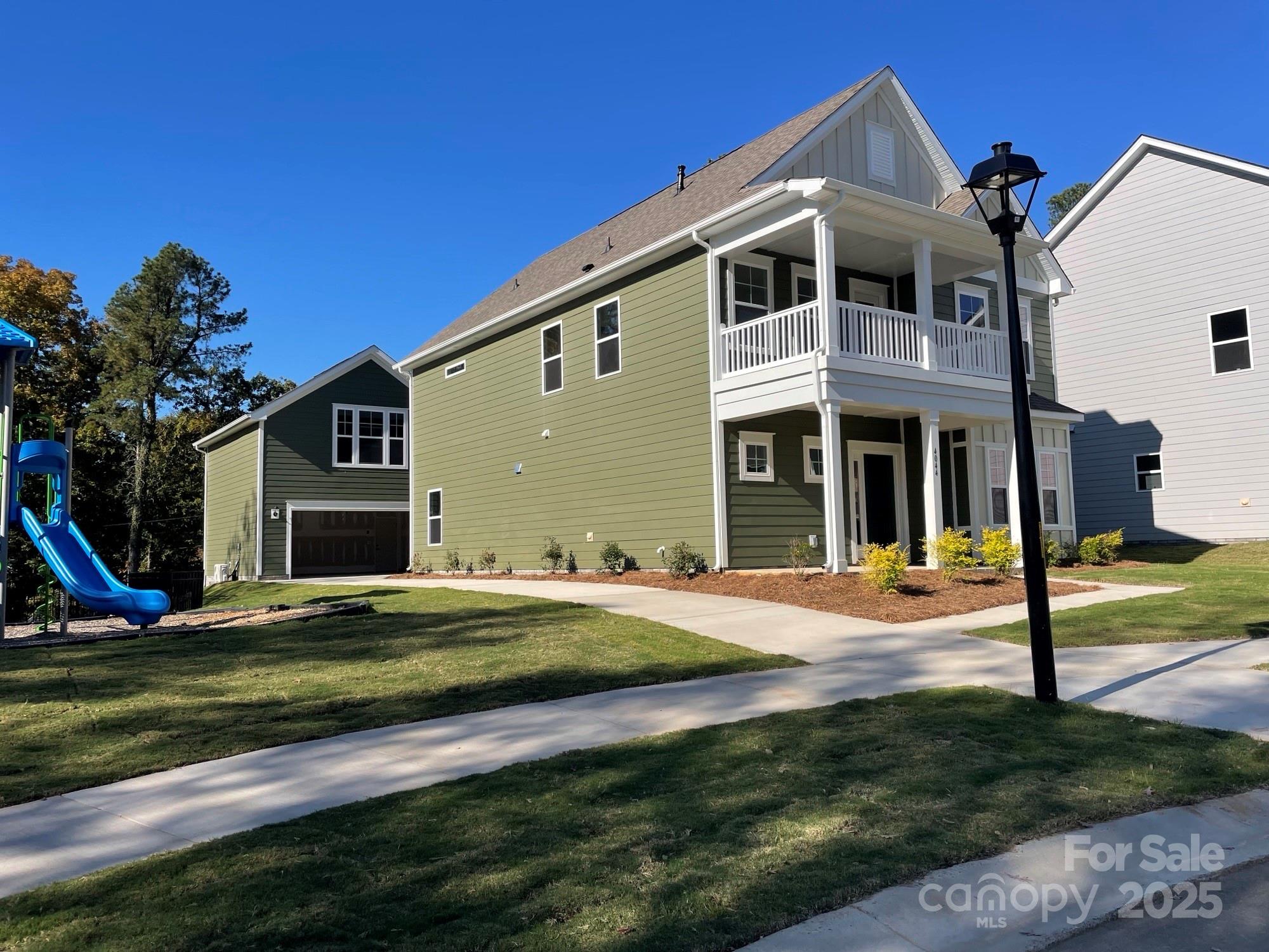 4044 Grommet Court Matthews, NC 28105 - Photo 2 of 27 a front view of a house with a yard