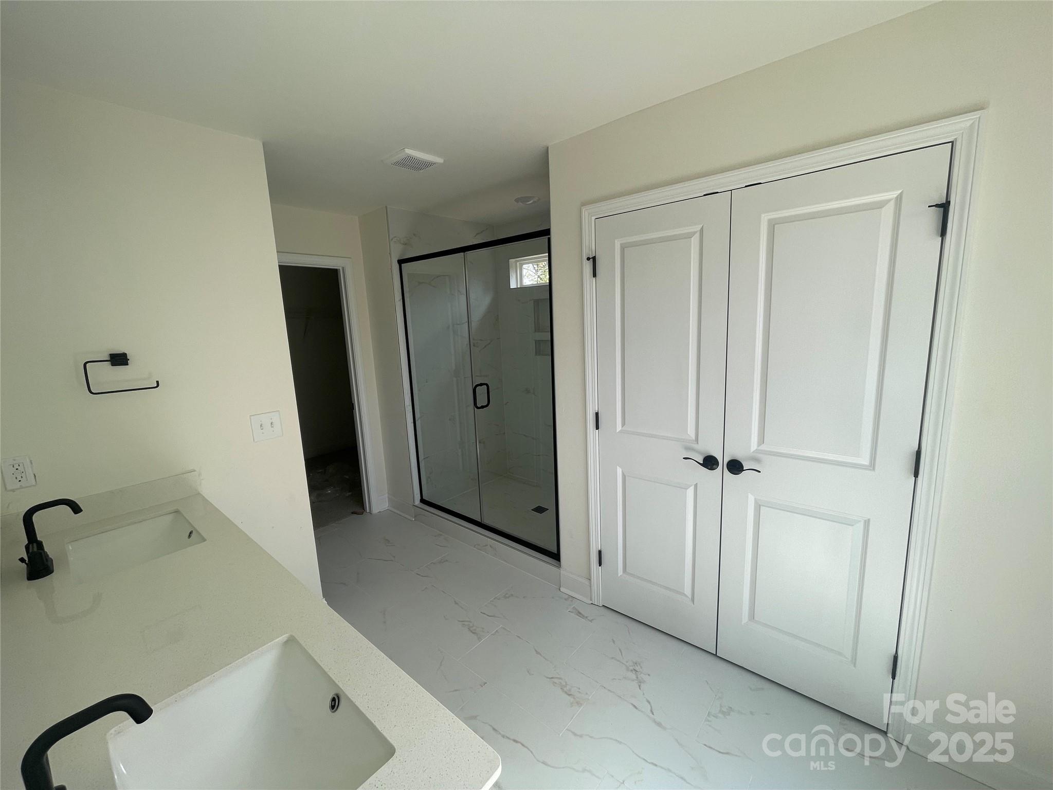 4044 Grommet Court Matthews, NC 28105 - Photo 24 of 27 a bathroom with a tub and shower