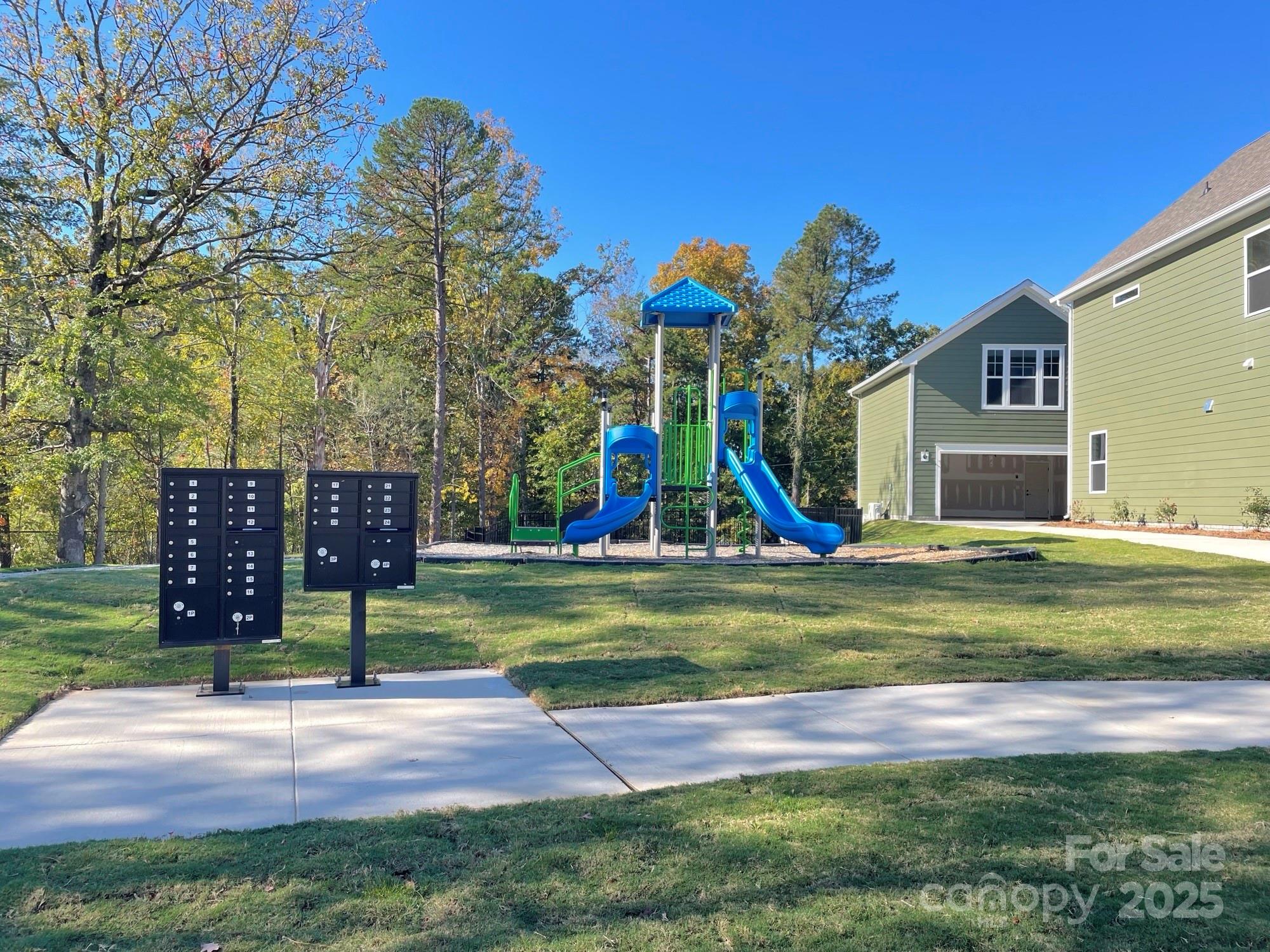 4044 Grommet Court Matthews, NC 28105 - Photo 6 of 27 a view of a park with slide