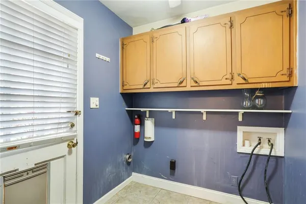 a bathroom with a sink a mirror and shower