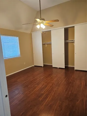 a view of a livingroom with wooden floor