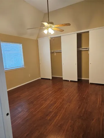 a view of a livingroom with wooden floor