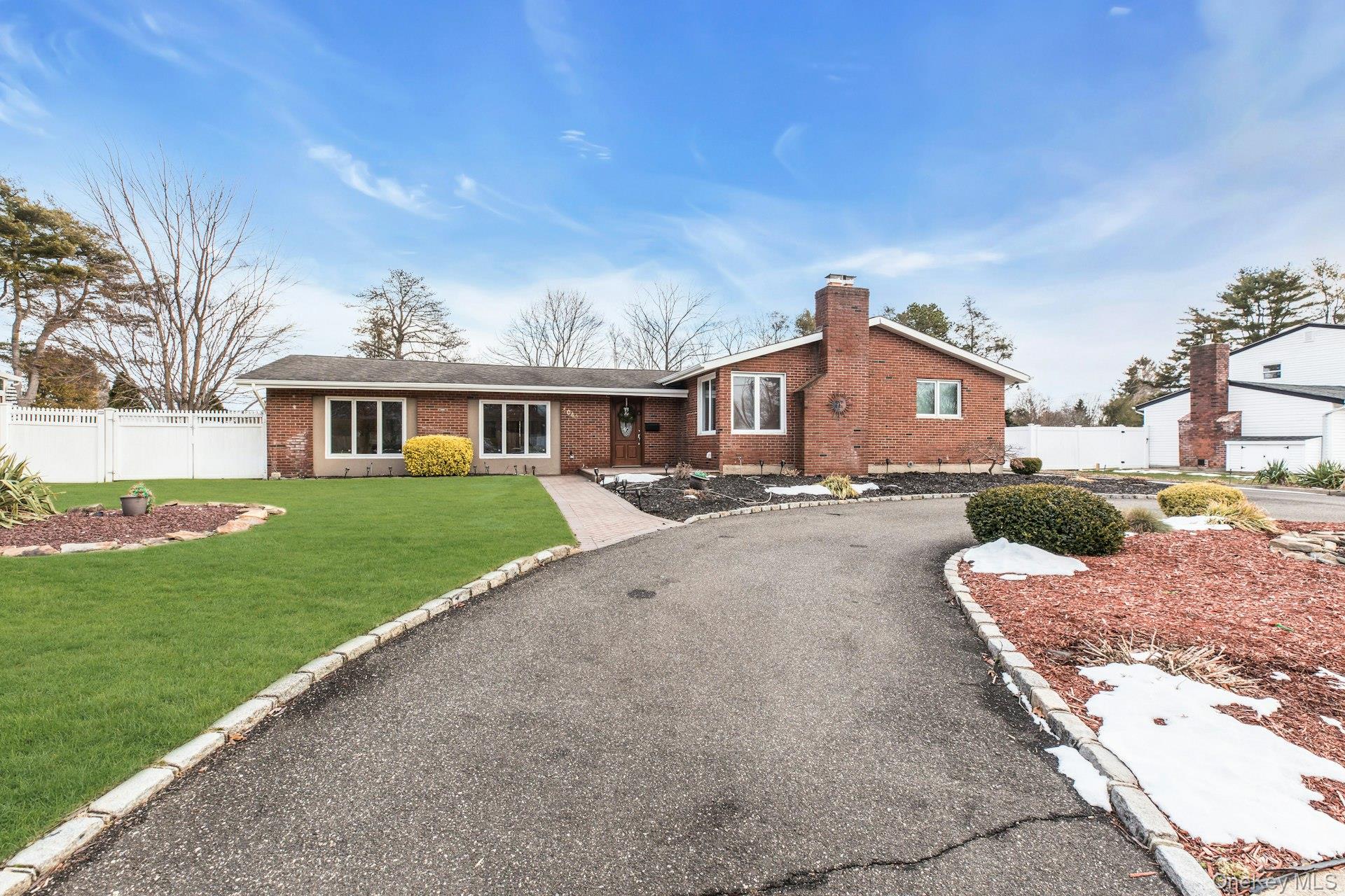 1044 Commack Road Dix Hills, NY 11746 - Photo 2 of 29 Ranch-style house featuring brick siding and a chimney