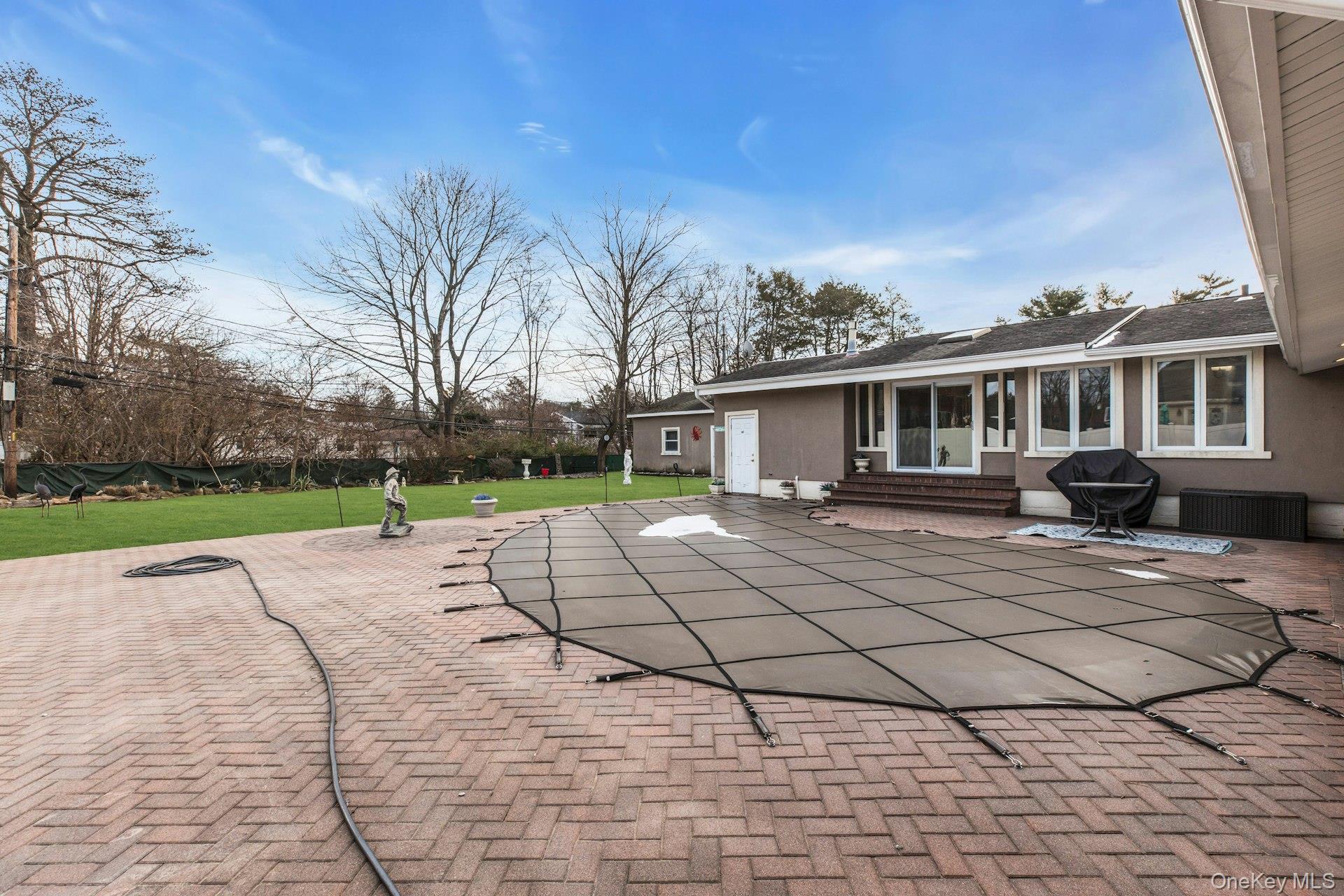 1044 Commack Road Dix Hills, NY 11746 - Photo 28 of 29 View of patio / terrace with entry steps and a grill