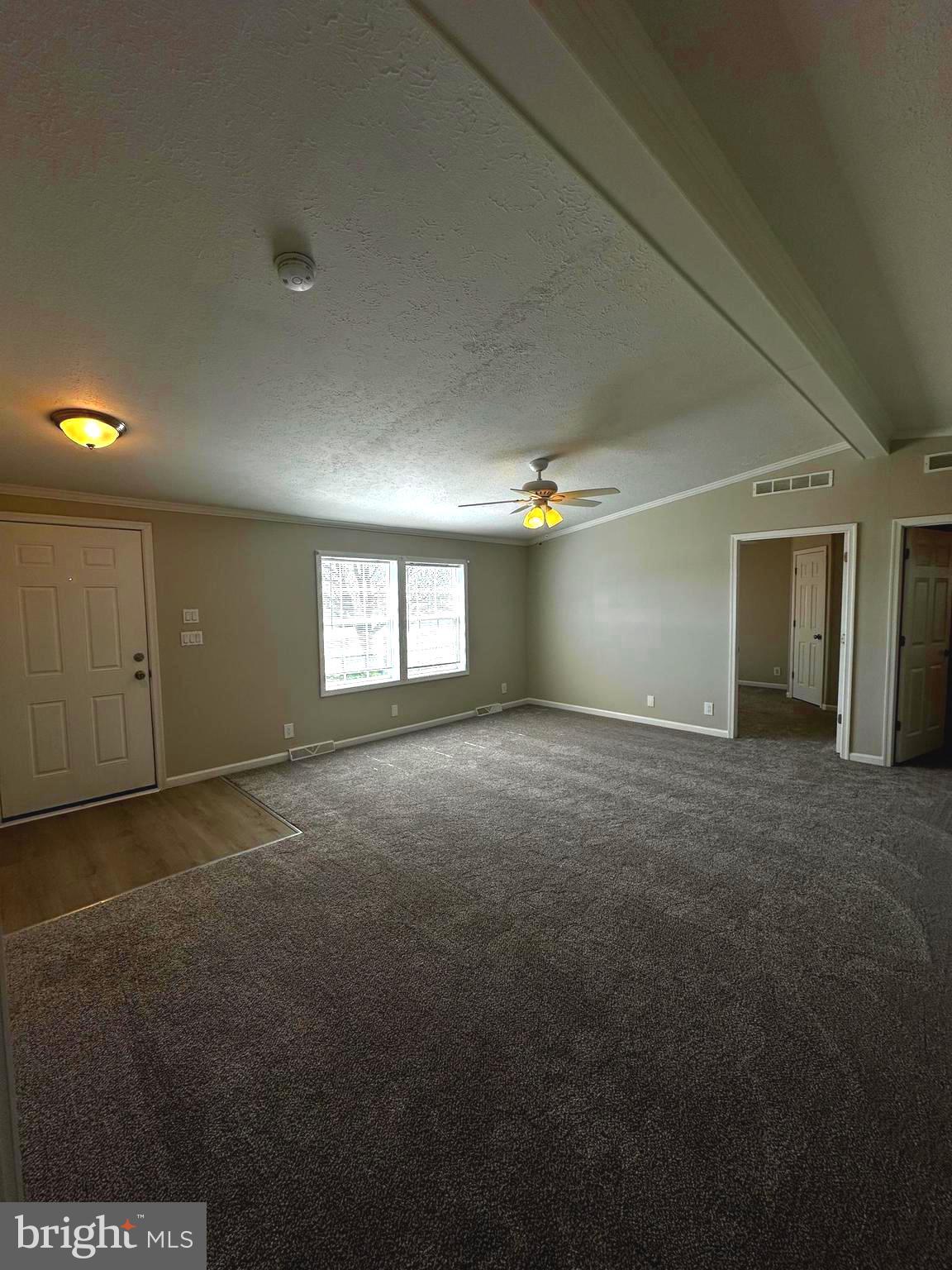 11433 Trussum Pond Road Laurel, DE 19956 - Photo 12 of 27 a view of empty room with windows