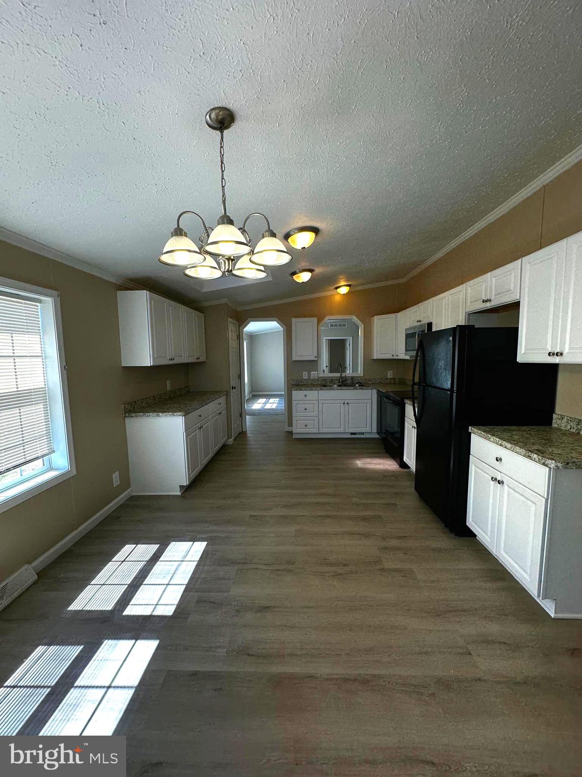 11433 Trussum Pond Road Laurel, DE 19956 - Photo 14 of 27 a view of a kitchen with a sink and dishwasher