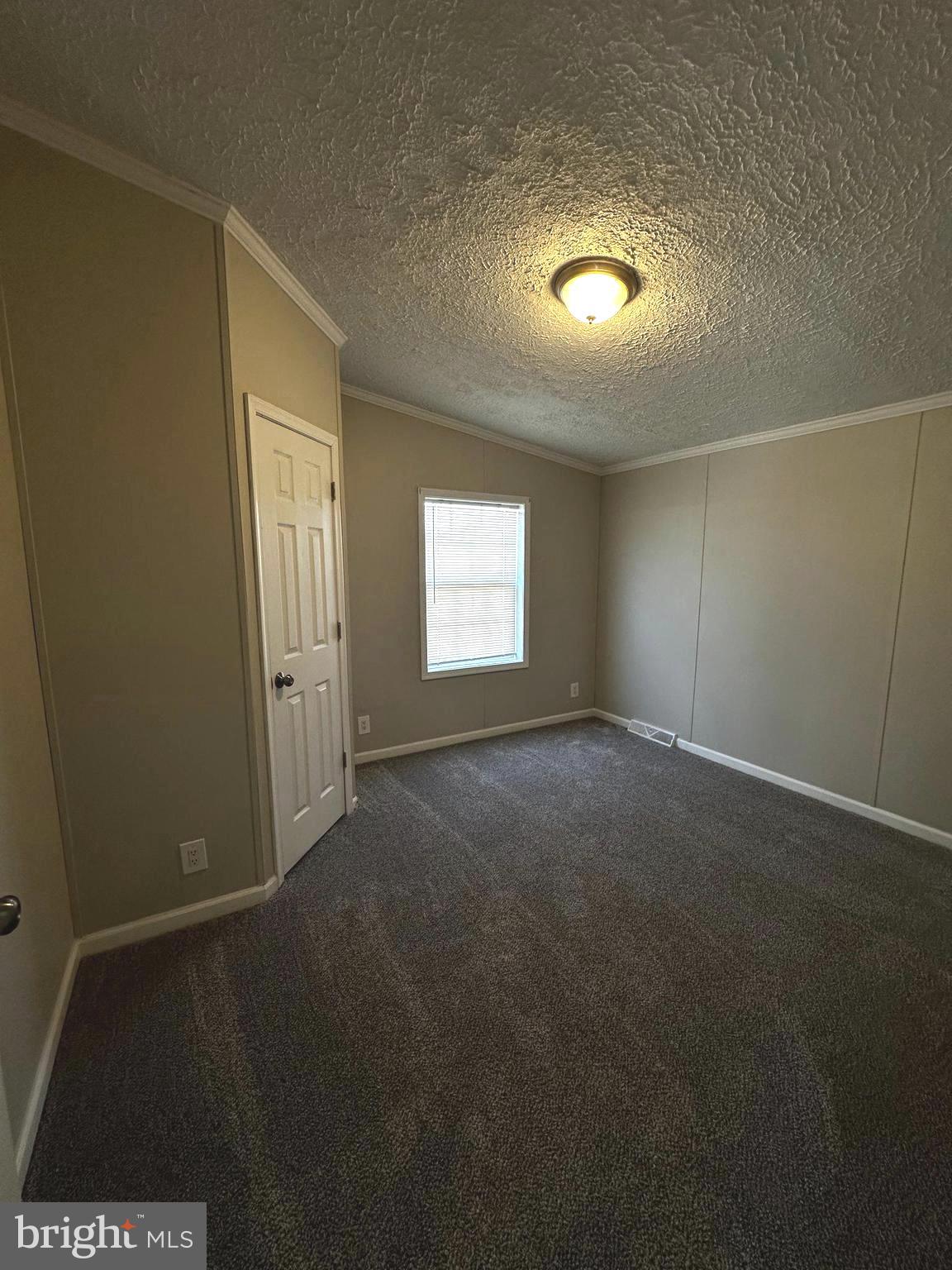 11433 Trussum Pond Road Laurel, DE 19956 - Photo 24 of 27 a view of an empty room and window