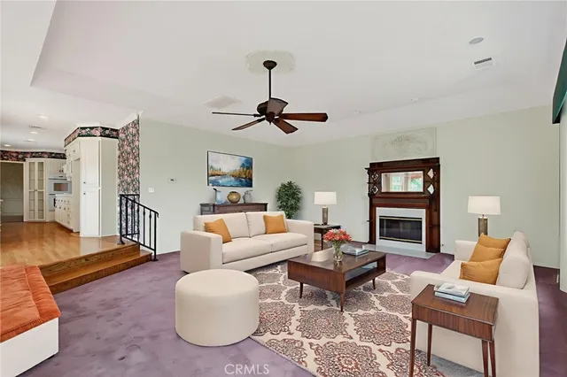 a view of empty room with a ceiling fan