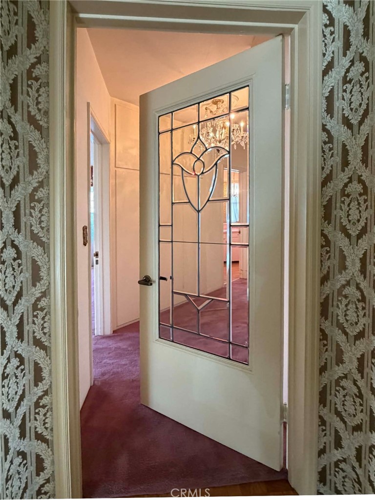 3985 Rice Road Riverside, CA 92506 - Photo 22 of 45 Interior hallway door leading to bedrooms.