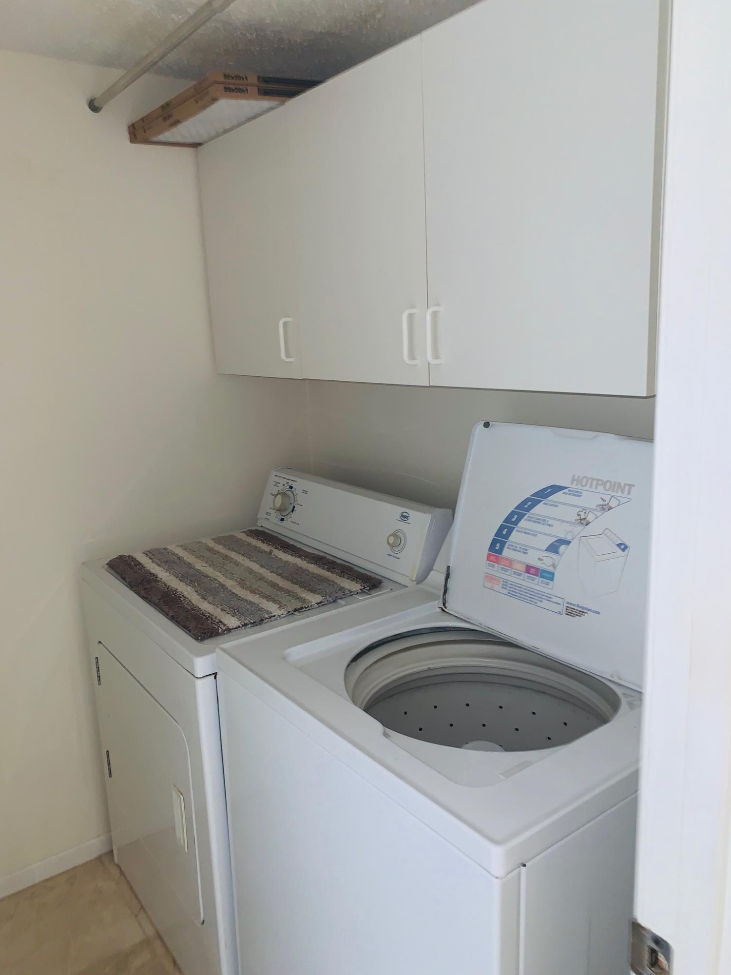 4200 North Ocean Drive, Unit 103 Riviera Beach, FL 33404 - Photo 13 of 16 a utility room with dryer and washer