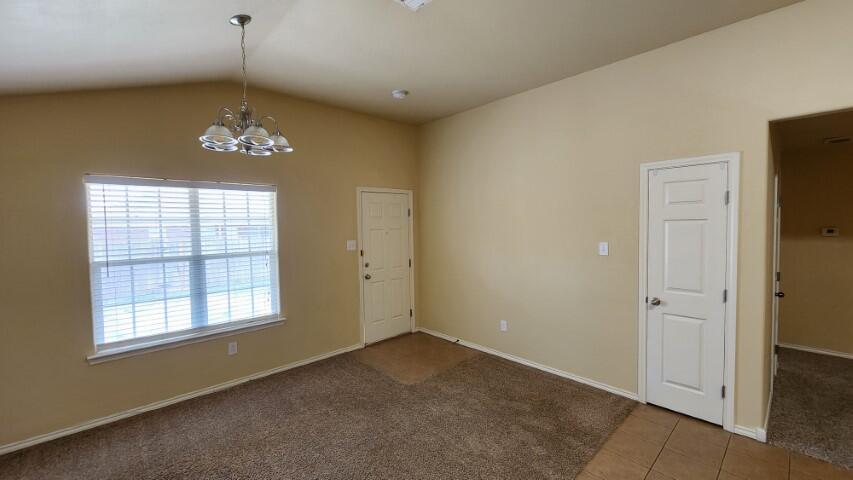 6535 93rd Street Lubbock, TX 79424 - Photo 5 of 13 an empty room with a window