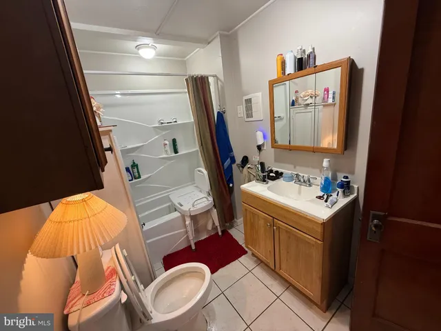 a bathroom with sink and mirror