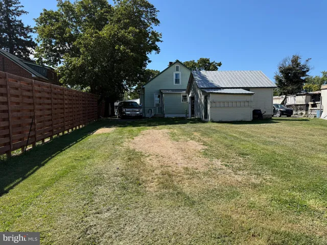 a house with yard in front of it