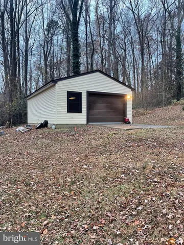 a house with trees in front of it