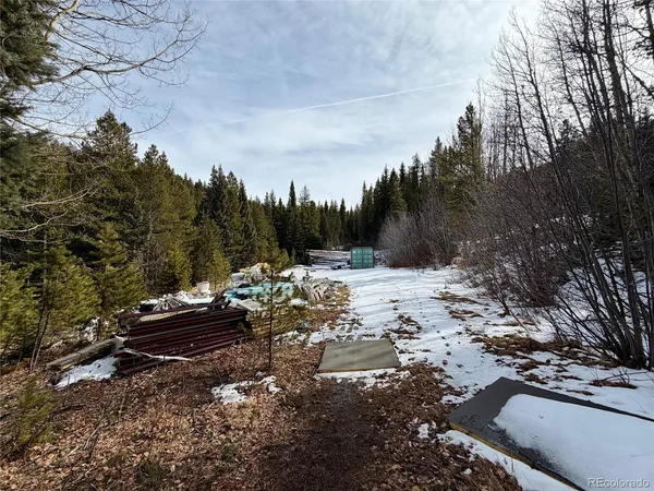 a view of a backyard of the house