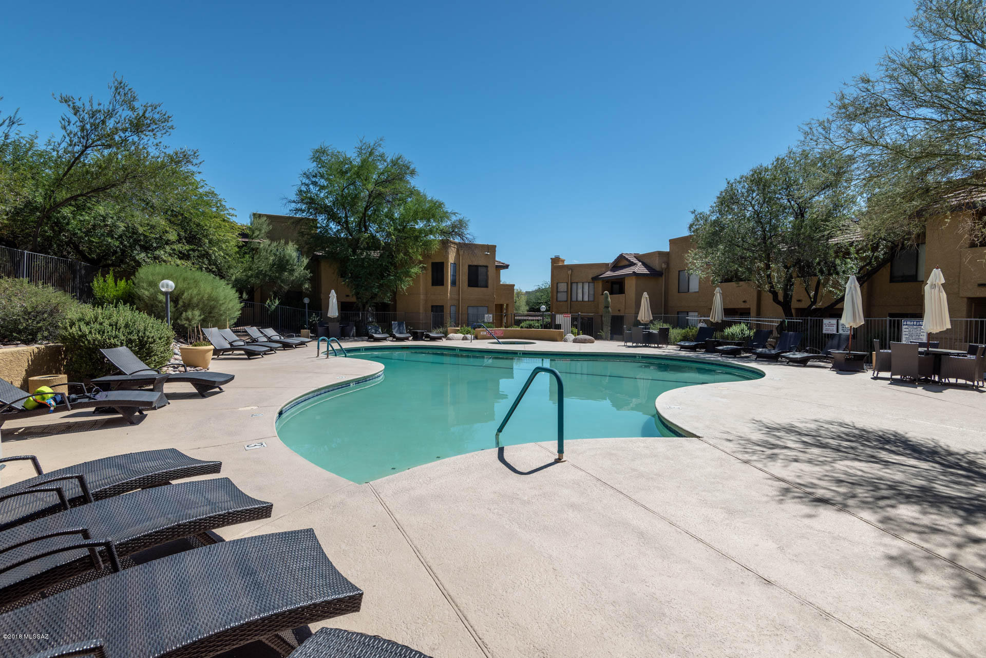 7255 East Snyder Road, Unit 8205 Tucson, AZ 85750 - Photo 19 of 23 a park with lots of swings and slides