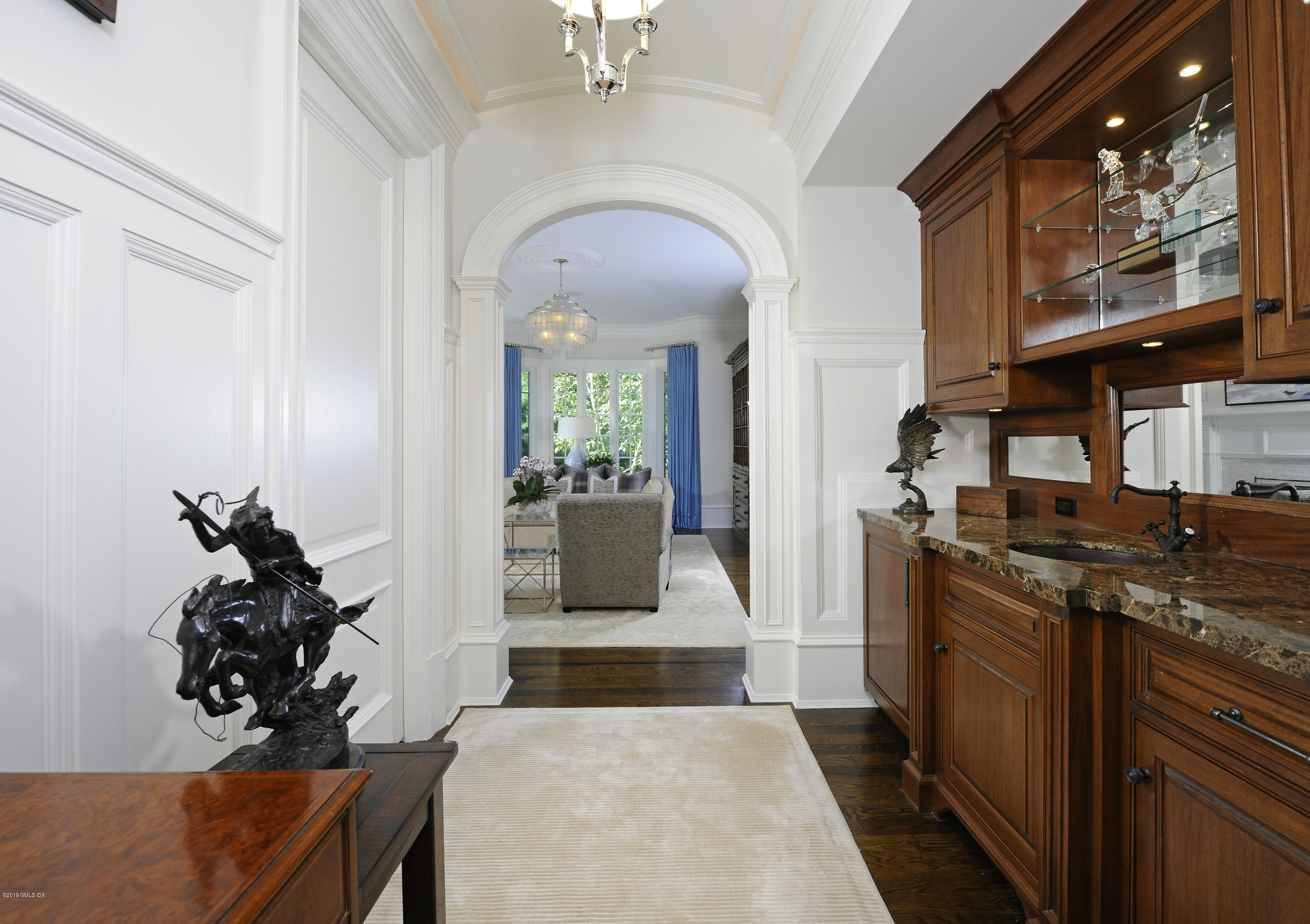 22 Cornelia Drive Greenwich, CT 06830 - Photo 11 of 34 a kitchen with stainless steel appliances granite countertop a stove and a refrigerator
