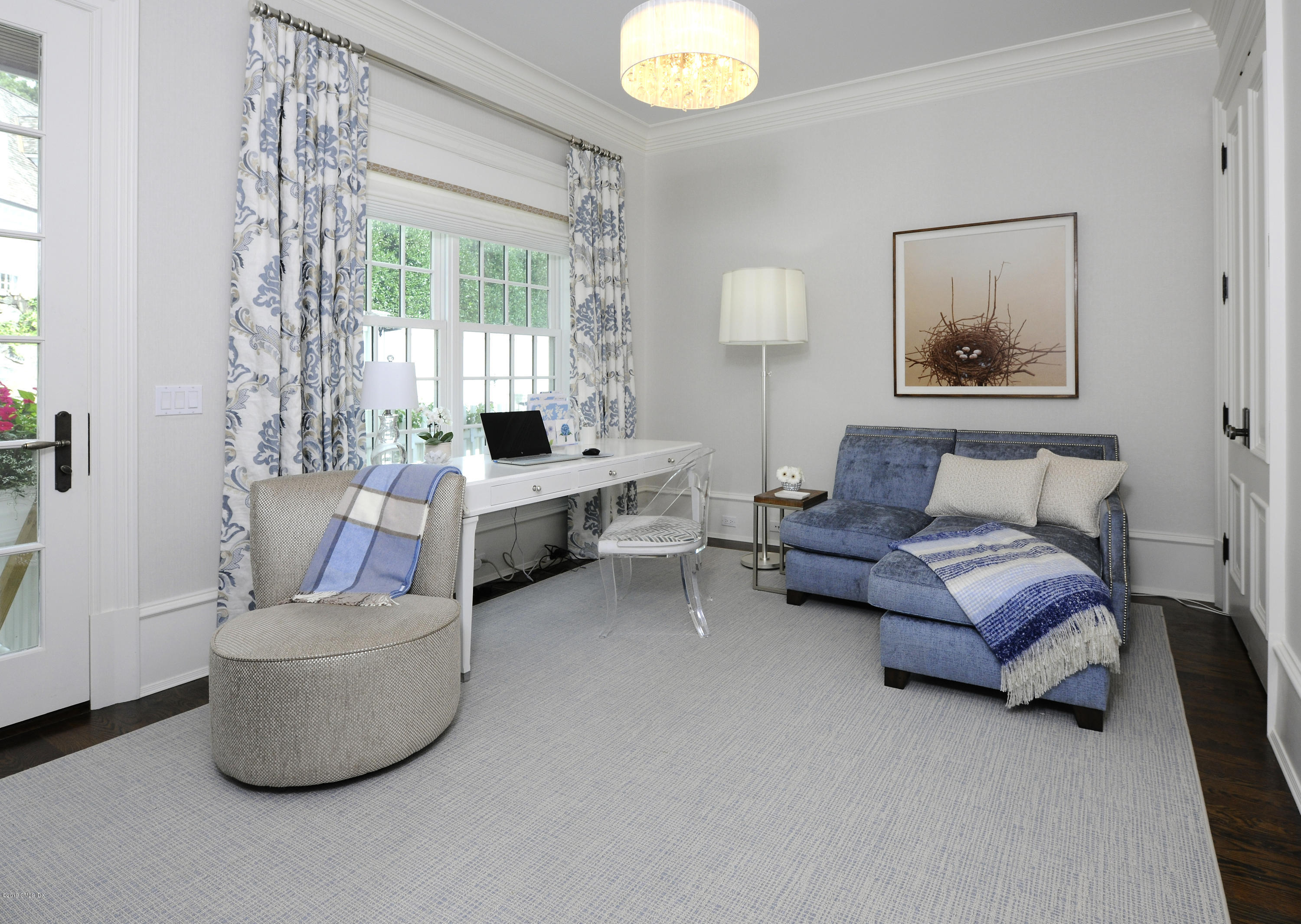 22 Cornelia Drive Greenwich, CT 06830 - Photo 12 of 34 a living room with furniture and a large window