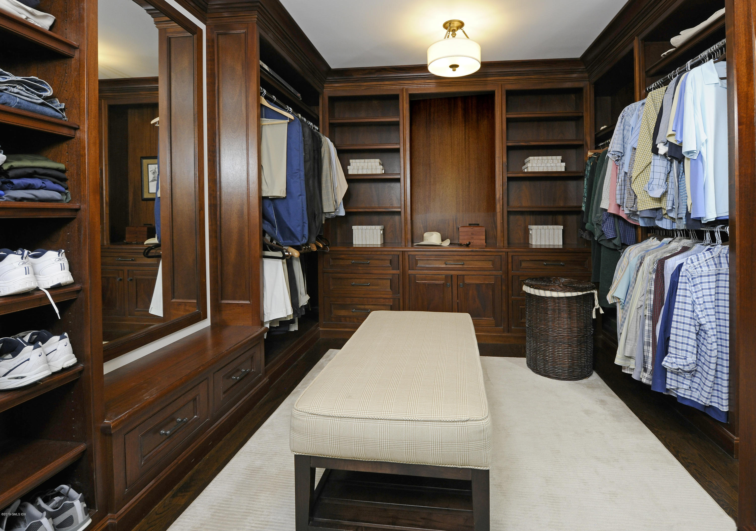 22 Cornelia Drive Greenwich, CT 06830 - Photo 24 of 34 a kitchen with a sink and a stove top oven