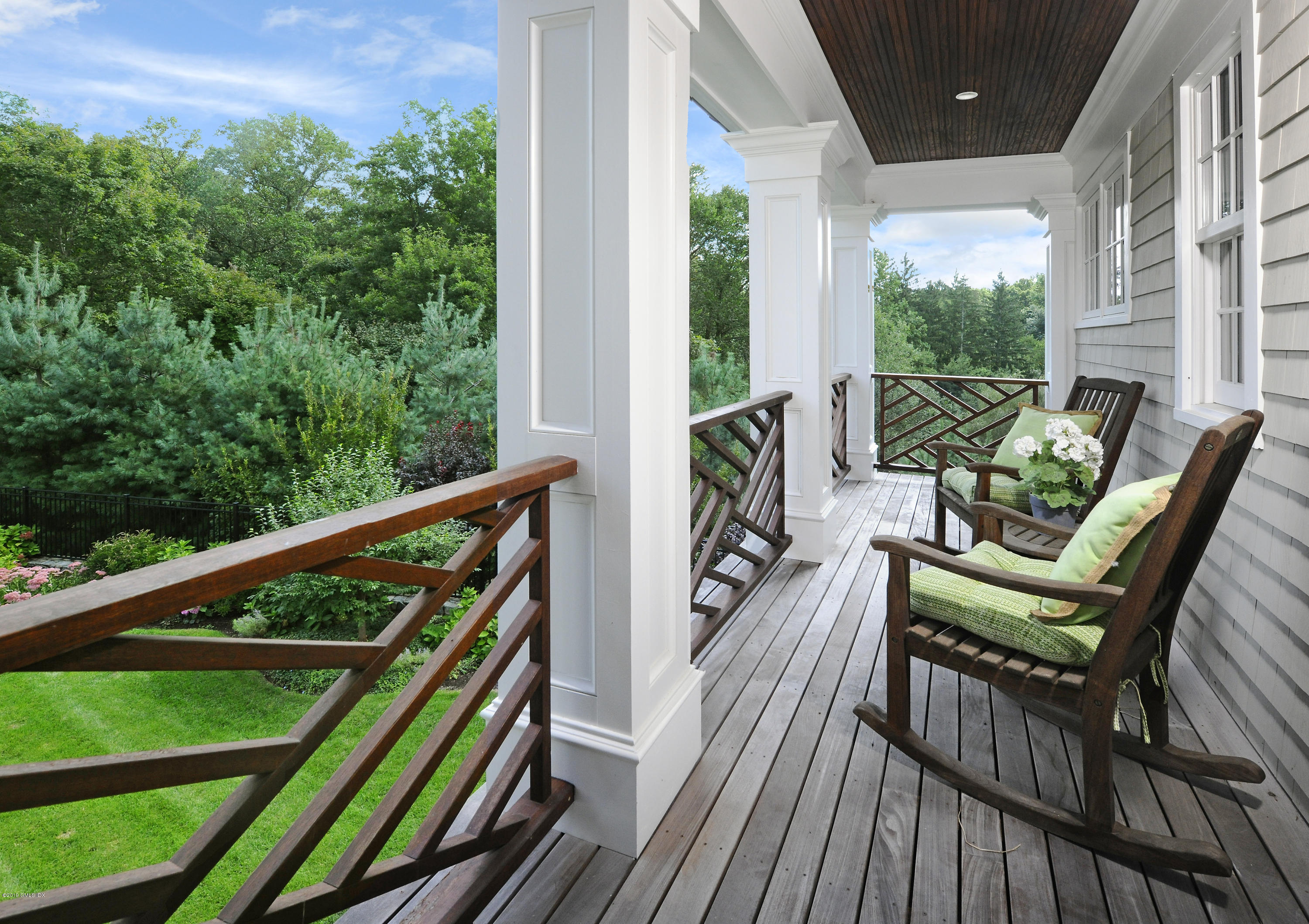 22 Cornelia Drive Greenwich, CT 06830 - Photo 25 of 34 a view of balcony with furniture and wooden deck