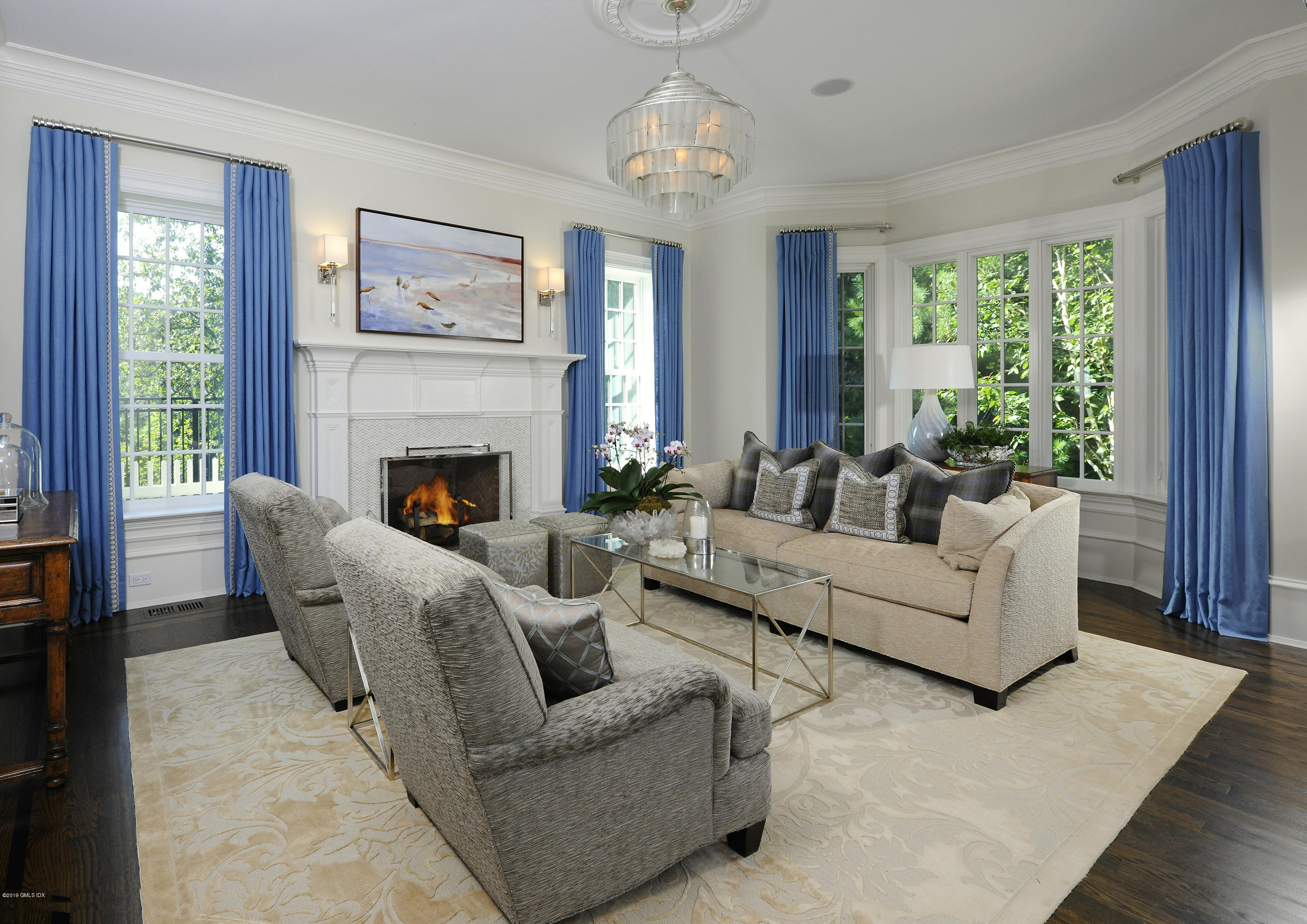 22 Cornelia Drive Greenwich, CT 06830 - Photo 6 of 34 a living room with furniture and a fireplace