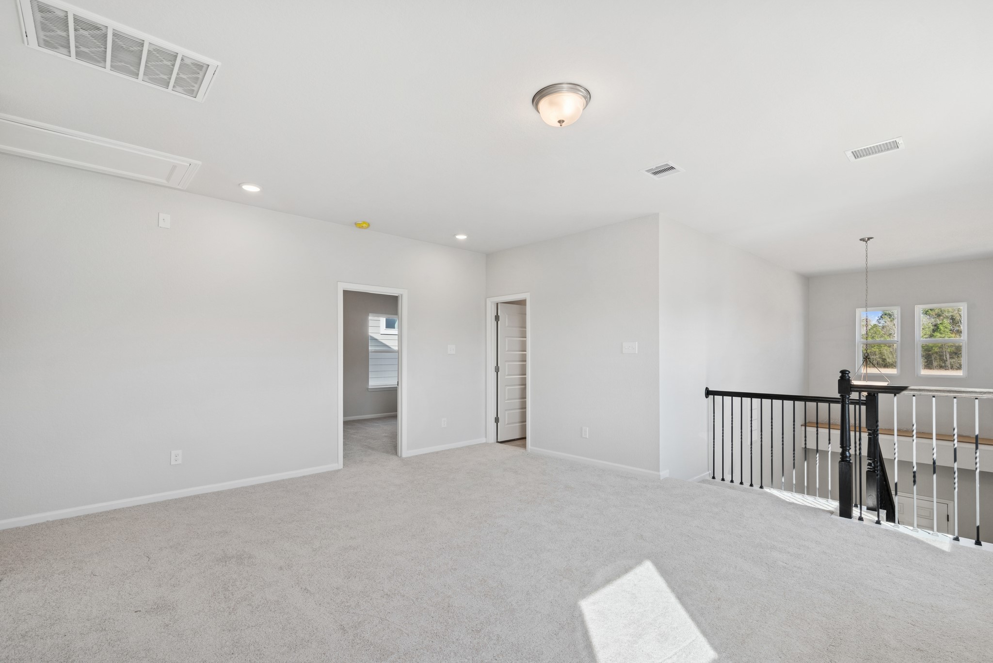 9761 Enclave Ridge Road Willis, TX 77318 - Photo 17 of 28 a view of an empty room