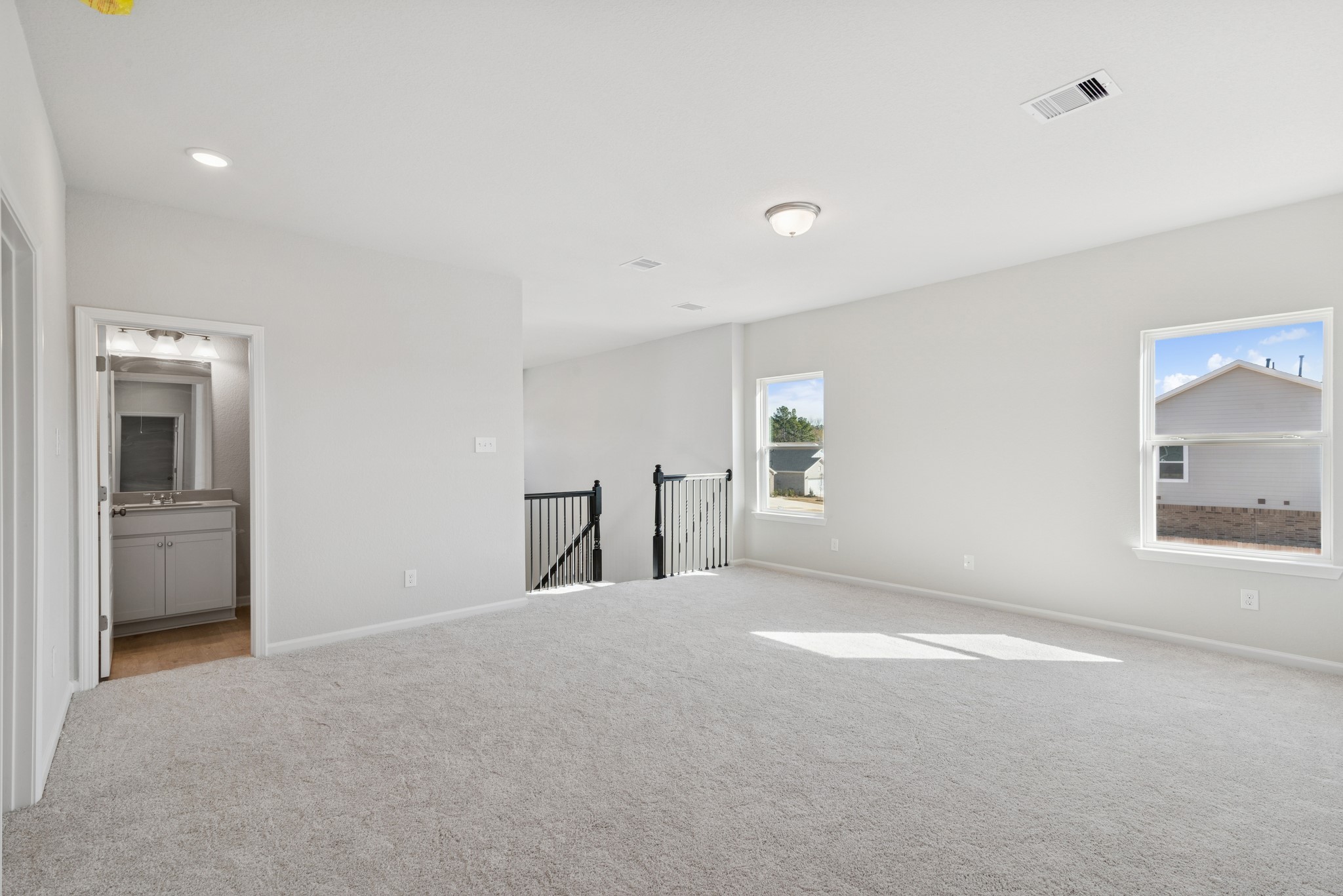 9761 Enclave Ridge Road Willis, TX 77318 - Photo 18 of 28 a view of an empty room with a window