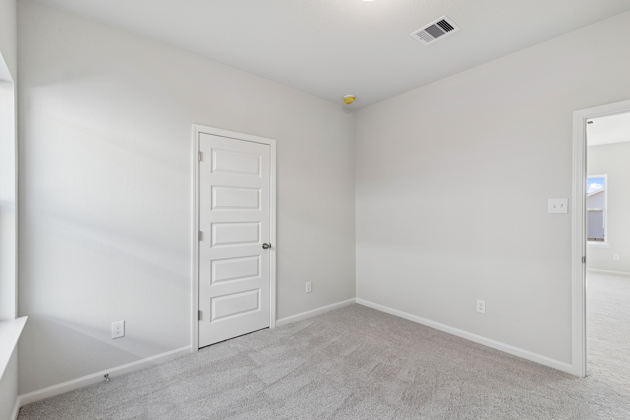 9761 Enclave Ridge Road Willis, TX 77318 - Photo 21 of 28 an empty room with closet