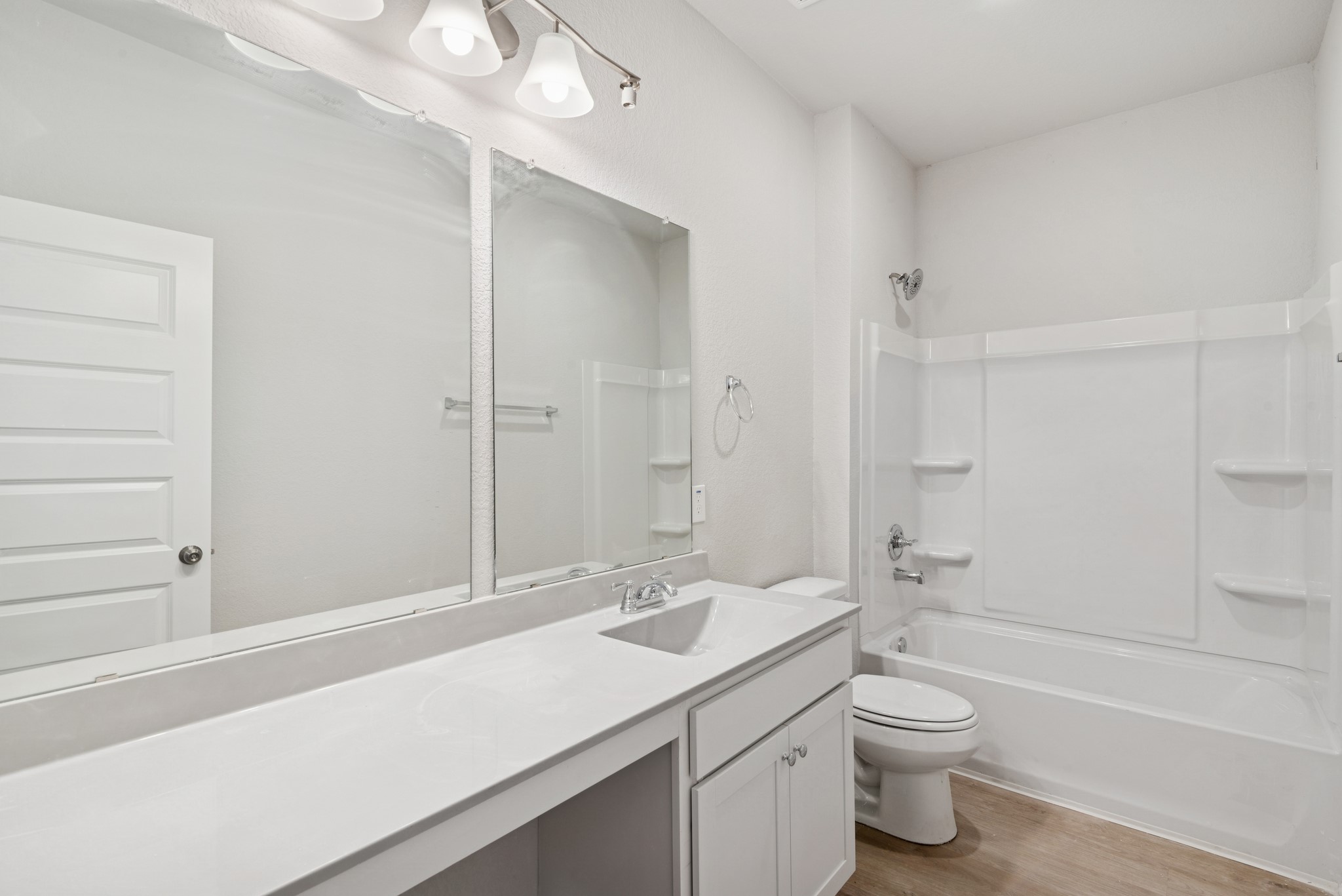 9761 Enclave Ridge Road Willis, TX 77318 - Photo 23 of 28 a bathroom with a sink a toilet and shower