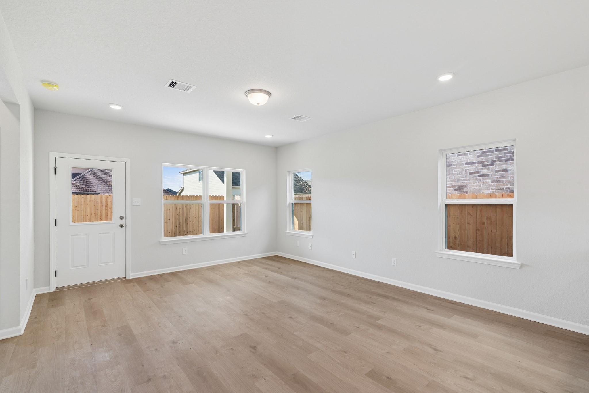 9761 Enclave Ridge Road Willis, TX 77318 - Photo 8 of 28 a view of an empty room with a window