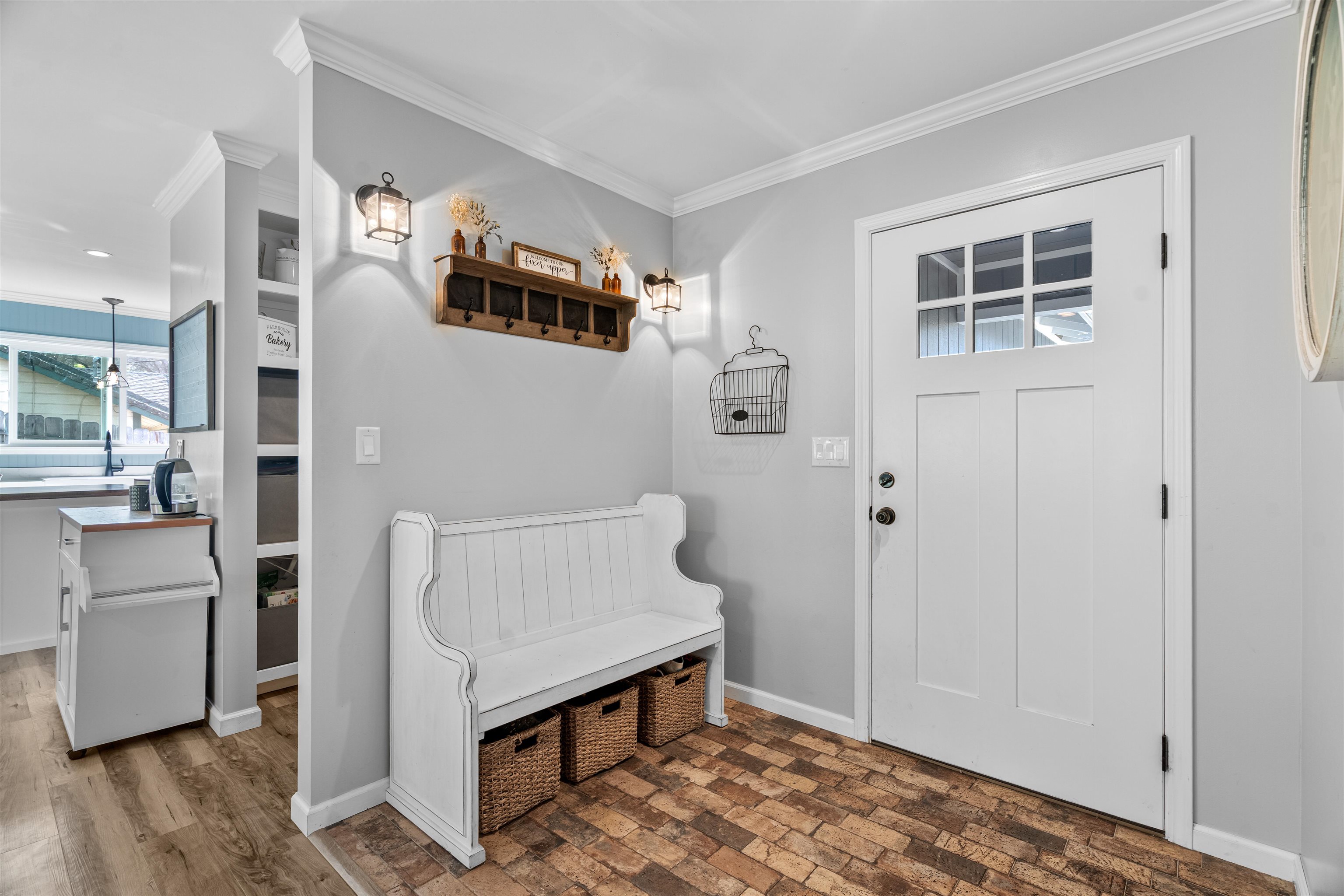 3281 Dunn Road Valley Springs, CA 95252 - Photo 11 of 59 Mudroom featuring ornamental molding and brick patterned flooring