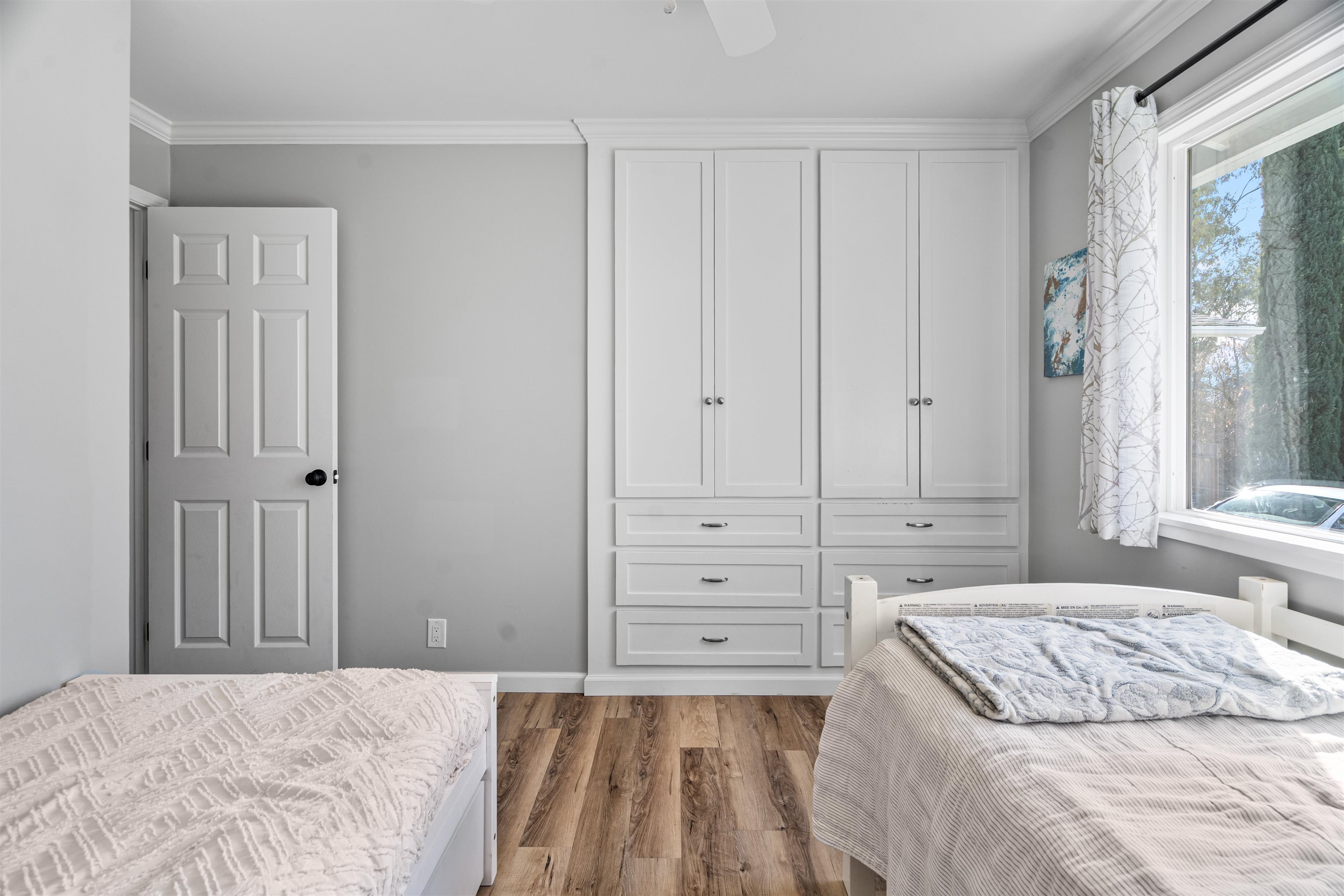 3281 Dunn Road Valley Springs, CA 95252 - Photo 28 of 59 Bedroom with ornamental molding, light wood-type flooring, and ceiling fan