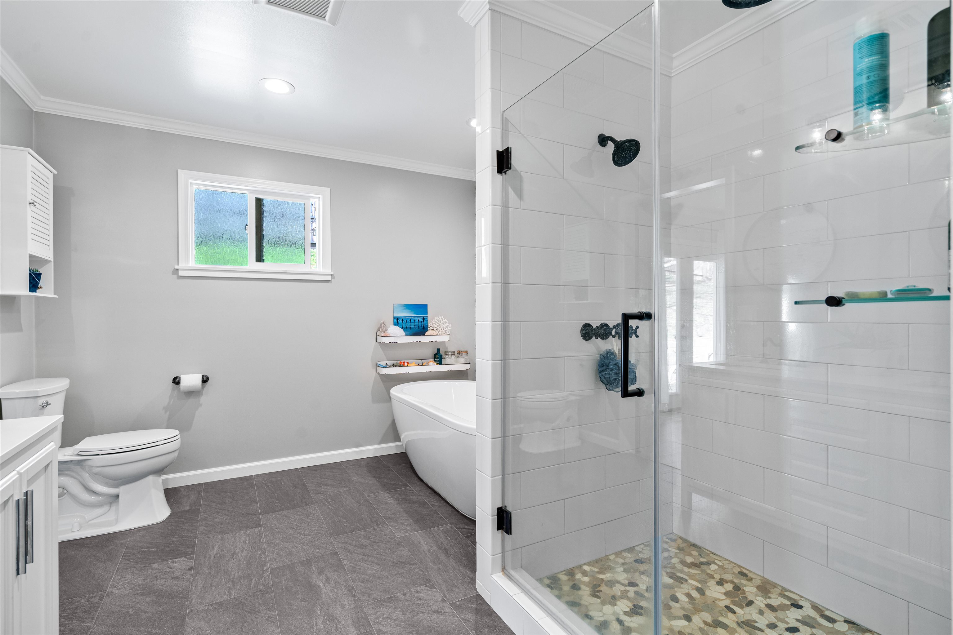 3281 Dunn Road Valley Springs, CA 95252 - Photo 34 of 59 Bathroom featuring a shower stall, a freestanding bath, ornamental molding, and vanity
