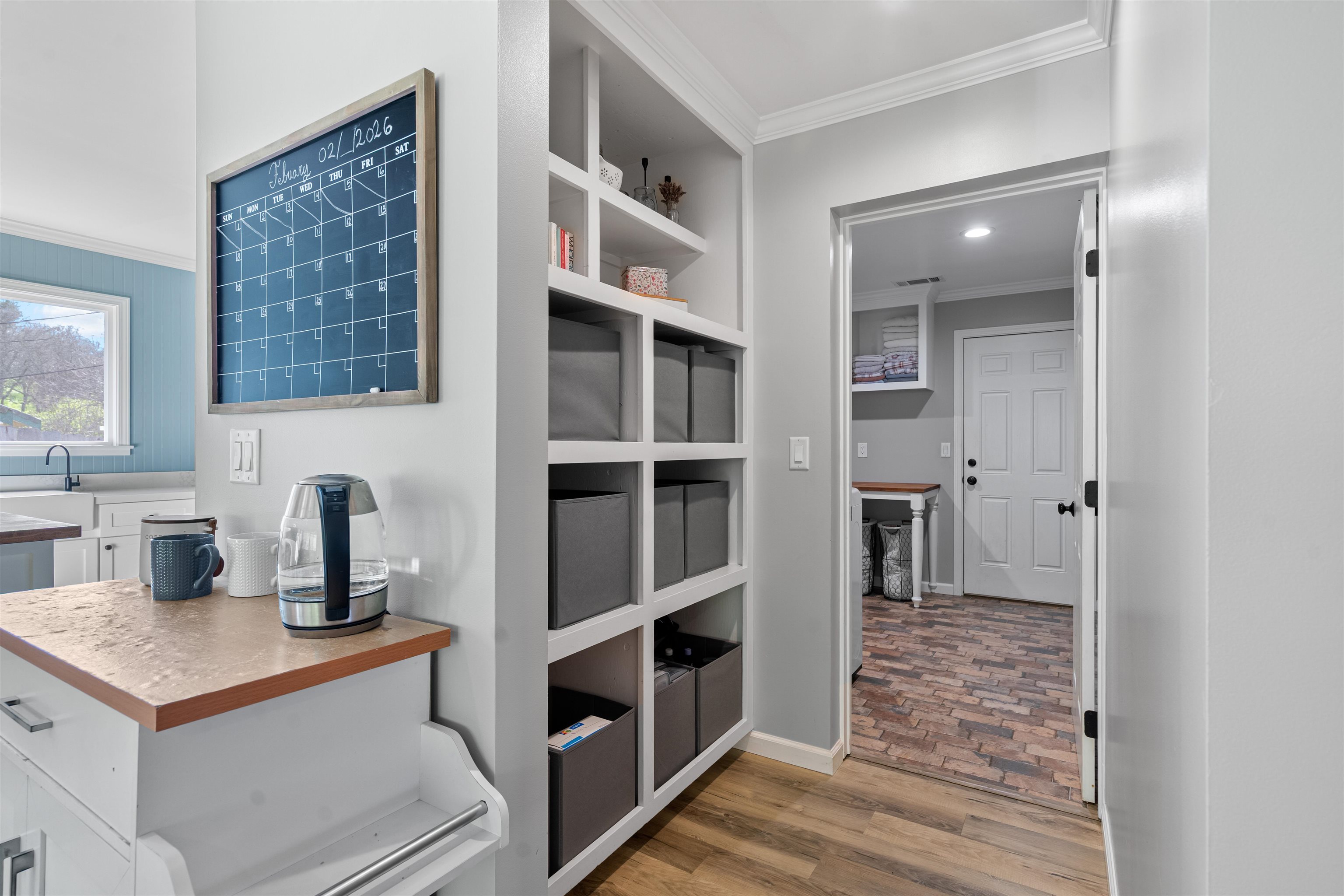 3281 Dunn Road Valley Springs, CA 95252 - Photo 38 of 59 Hallway with ornamental molding and light wood finished floors