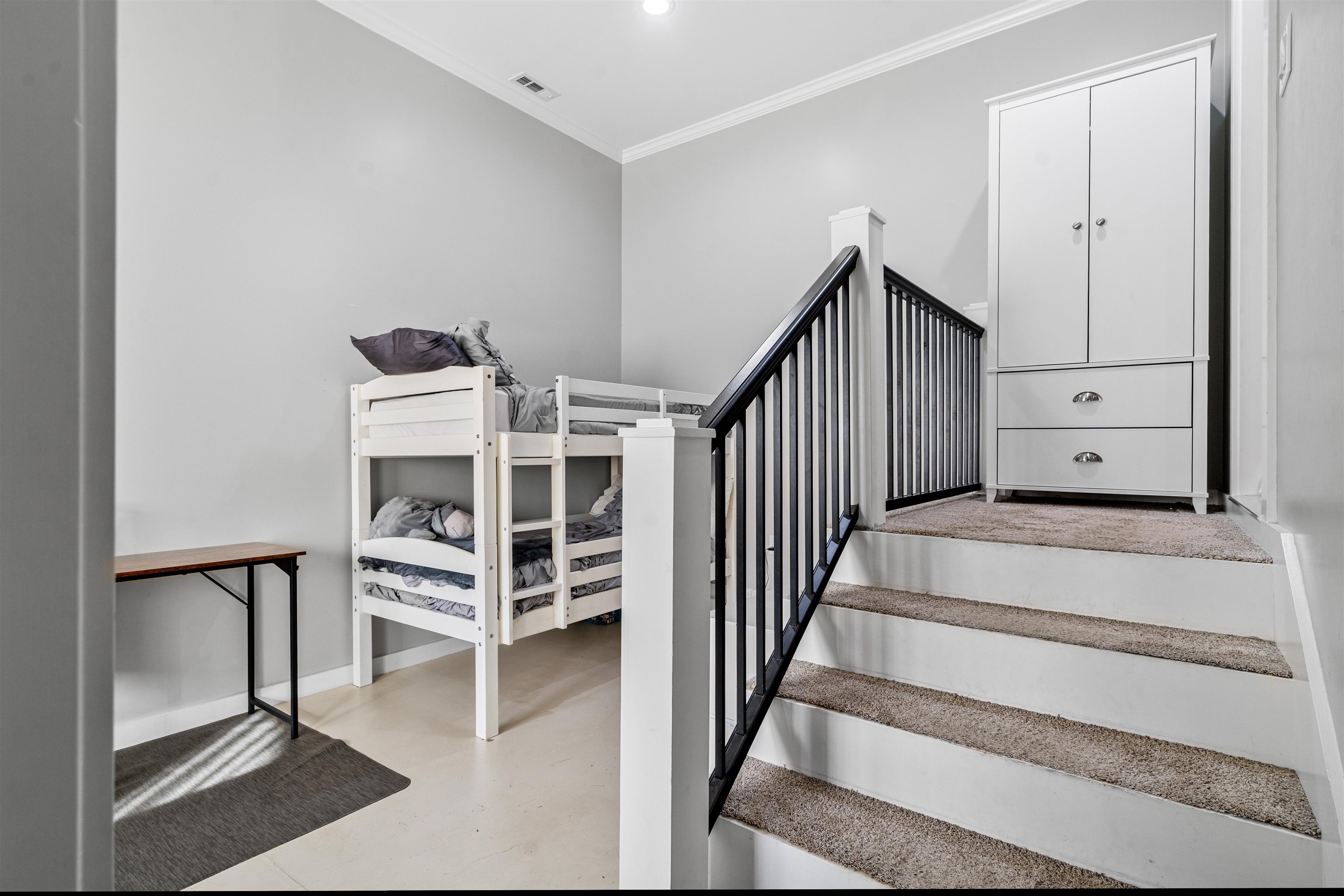 3281 Dunn Road Valley Springs, CA 95252 - Photo 42 of 59 Stairway featuring finished concrete floors, ornamental molding, and recessed lighting
