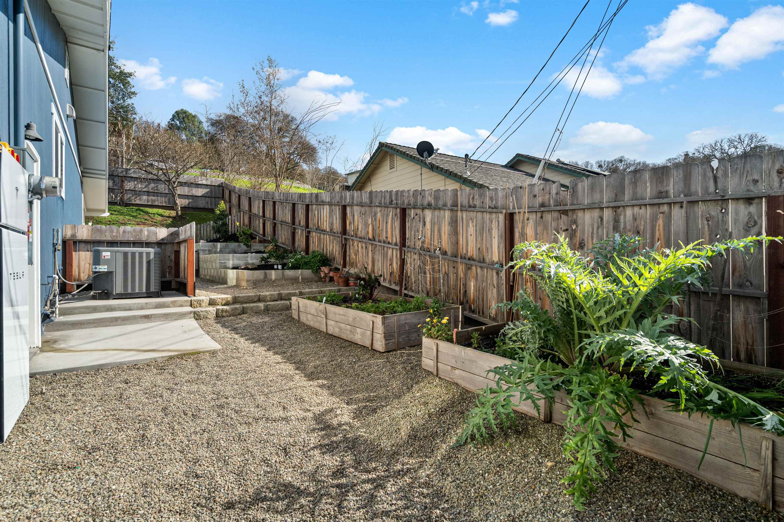 3281 Dunn Road Valley Springs, CA 95252 - Photo 49 of 59 Fenced backyard featuring a vegetable garden and a patio